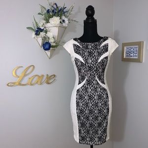 Flattering lace sheath dress. Like new. Size Small